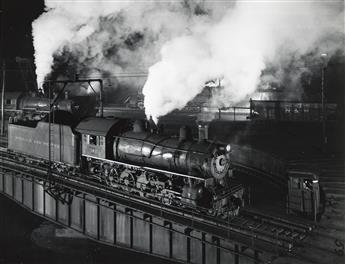 O. WINSTON LINK (1914-2001) A group of 5 photographs depicting scenes with Locomotives 104 and 563.